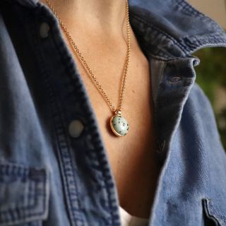 Golden Necklace with Large Green Speckled Resin Stone by Peace of Mind